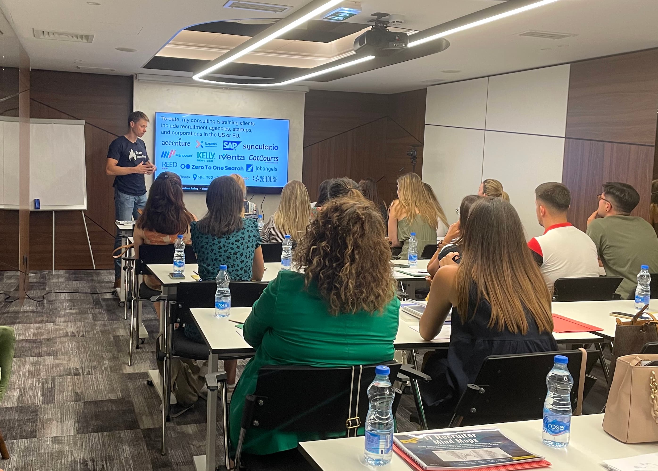 Michal presenting on AI in recruiting to an audience in Belgrade